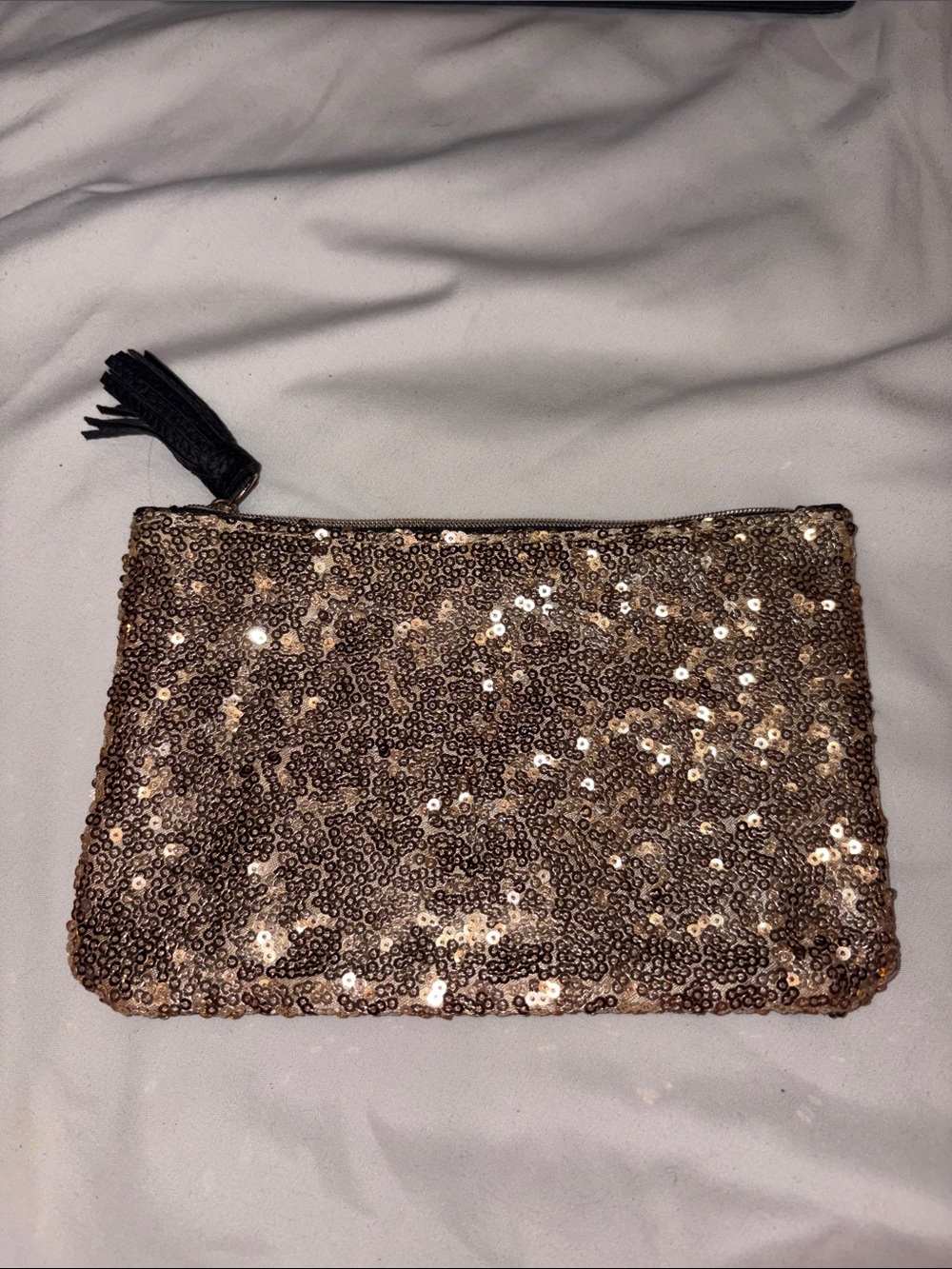 ipsy Sequin Tassel Zip Clutch in Rose Gold